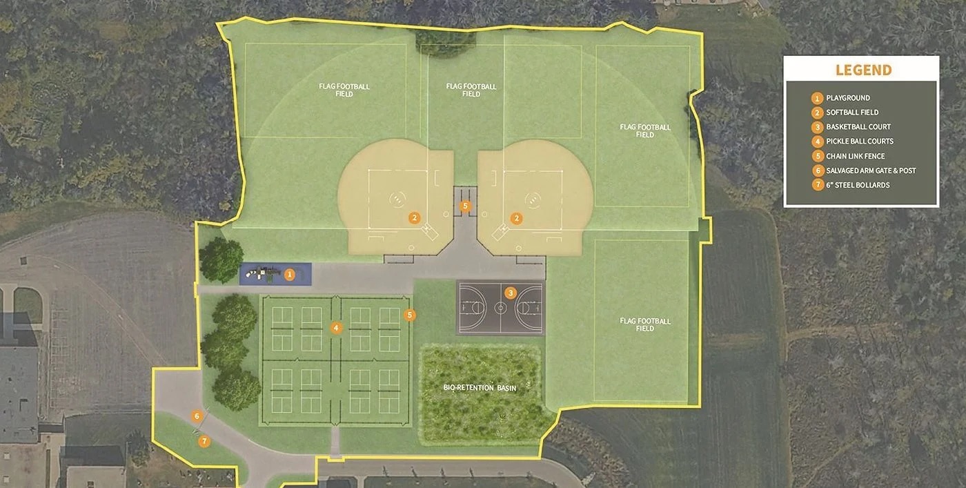 A top-down architectural map of a sports complex, showing two baseball diamonds, a parking lot, and a legend in the top right corner.